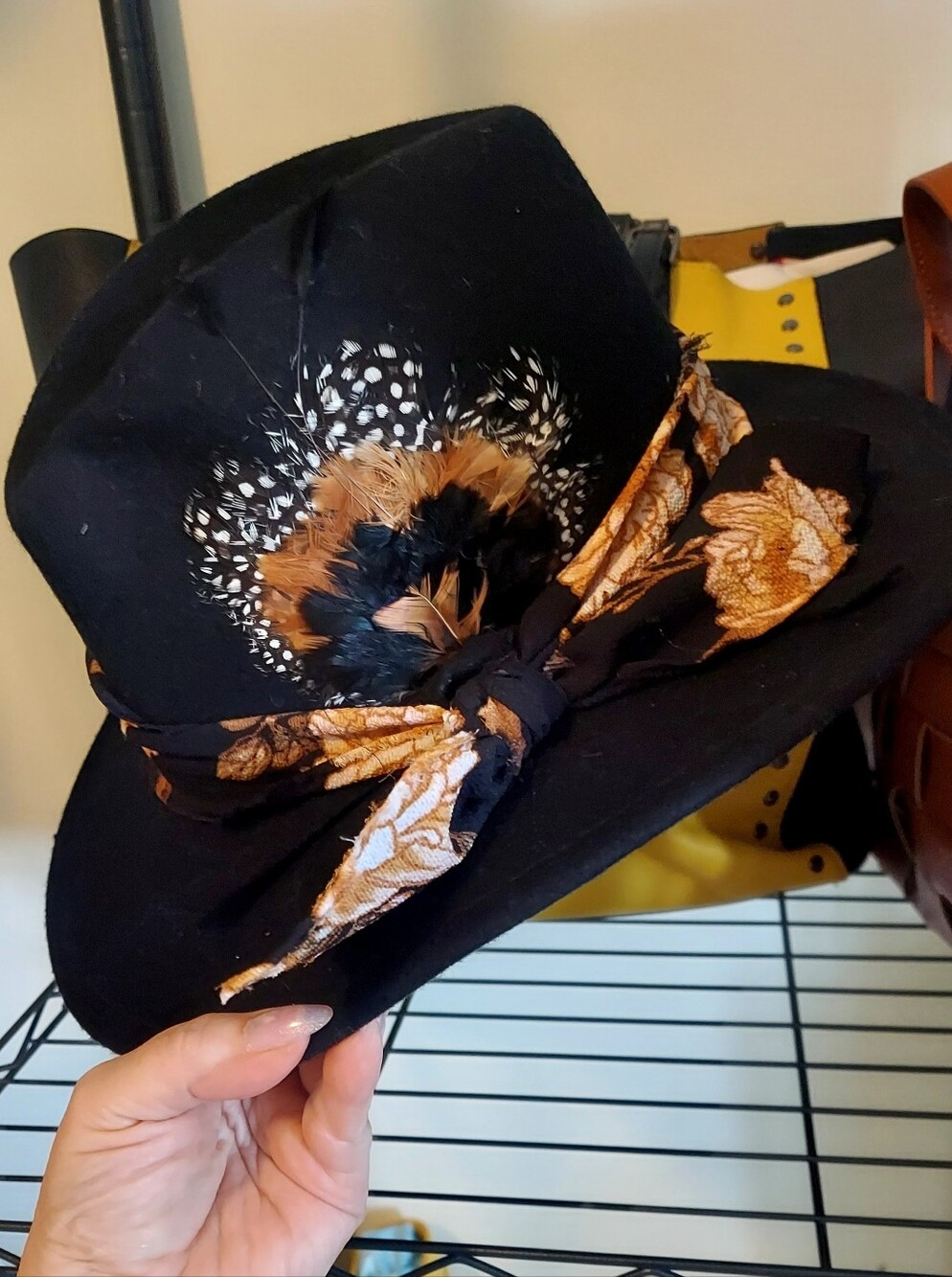 Black Feather-Embellished Fedora with Gold Floral Scarf